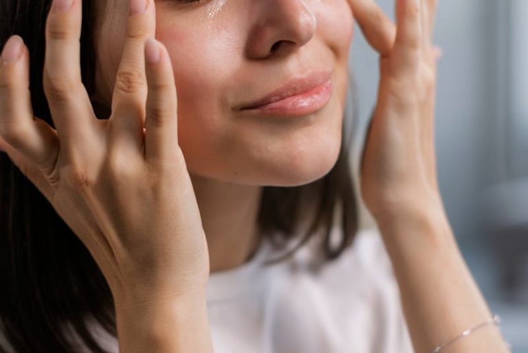 applying oil to face